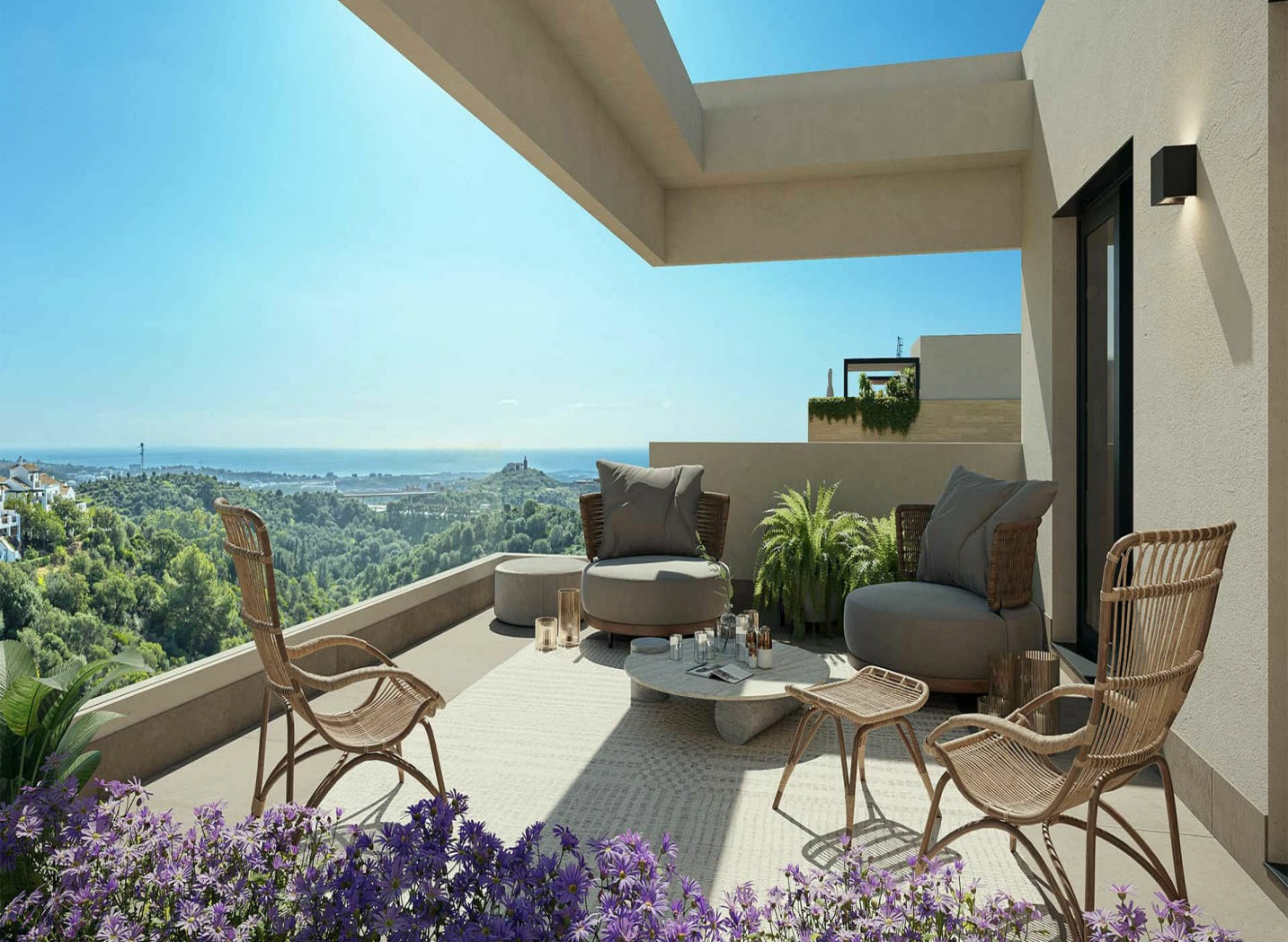 Terras met rotan loungestoelen en zeezicht Soleil Marbella